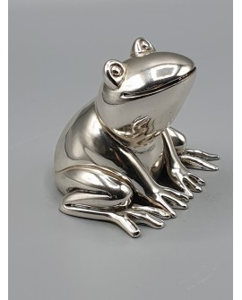 Frog in silver color marble dust.